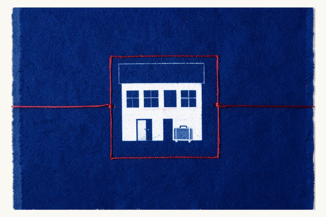 Permanent establishment of a foreign company in Turkey: a large low office building and a small suitcase at its door, both fenced in by a red thread rectangle, cyanotype print